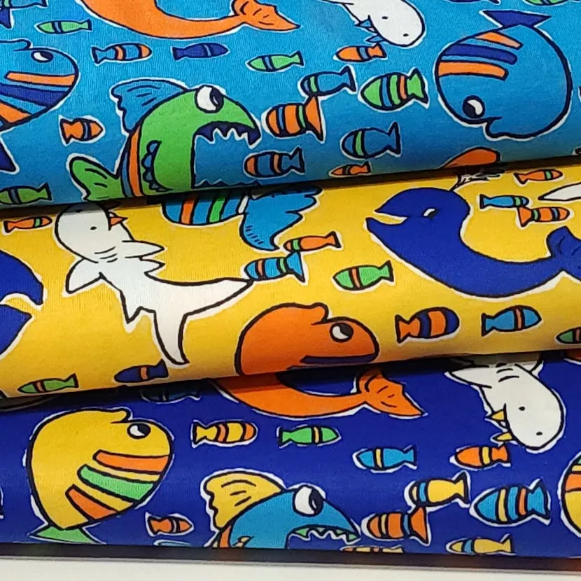 Cotton T-Shirt Stretch Knit Fabric, Colorful Whales, Sharks, and Fish. Lightweight 2-Way Stretch Cotton Blend Fabric. Sold by the 1/2 yard