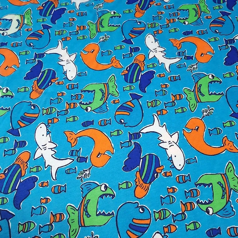 Cotton T-Shirt Stretch Knit Fabric, Colorful Whales, Sharks, and Fish. Lightweight 2-Way Stretch Cotton Blend Fabric. Sold by the 1/2 yard