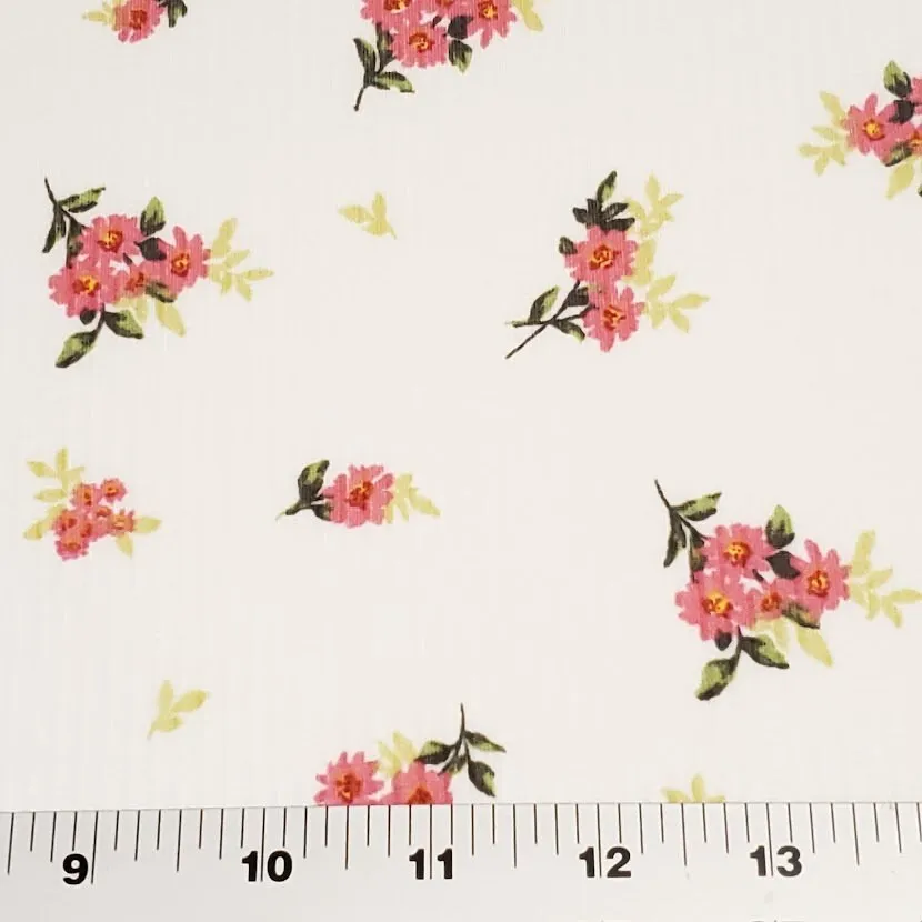 Ribbed Knit Fabric: 4x2 Rib Knit . Cute Ivory with Petite and Pretty Pink Flowers with Green Leaves. 4-Way Stretch, Sold by the 1/2 yard